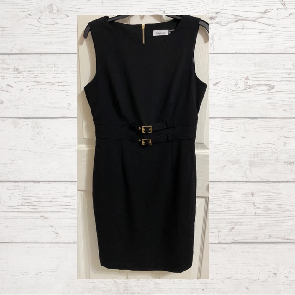 Calvin Klein black dress,double buckle front, zip in the back, 8